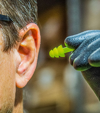 Person wearing J.J. Keller SAFEGEAR PPE Hearing Protection 