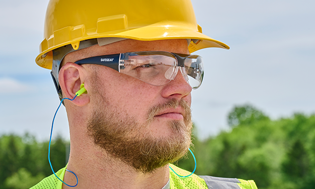 Person working with safety glasses