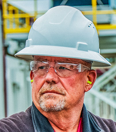 Employee wearing J.J. Keller SAFEGEAR PPE Head Protection